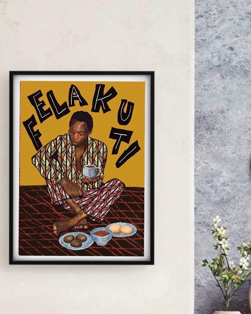 Tea with Fela artwork in black frame on a beige wall