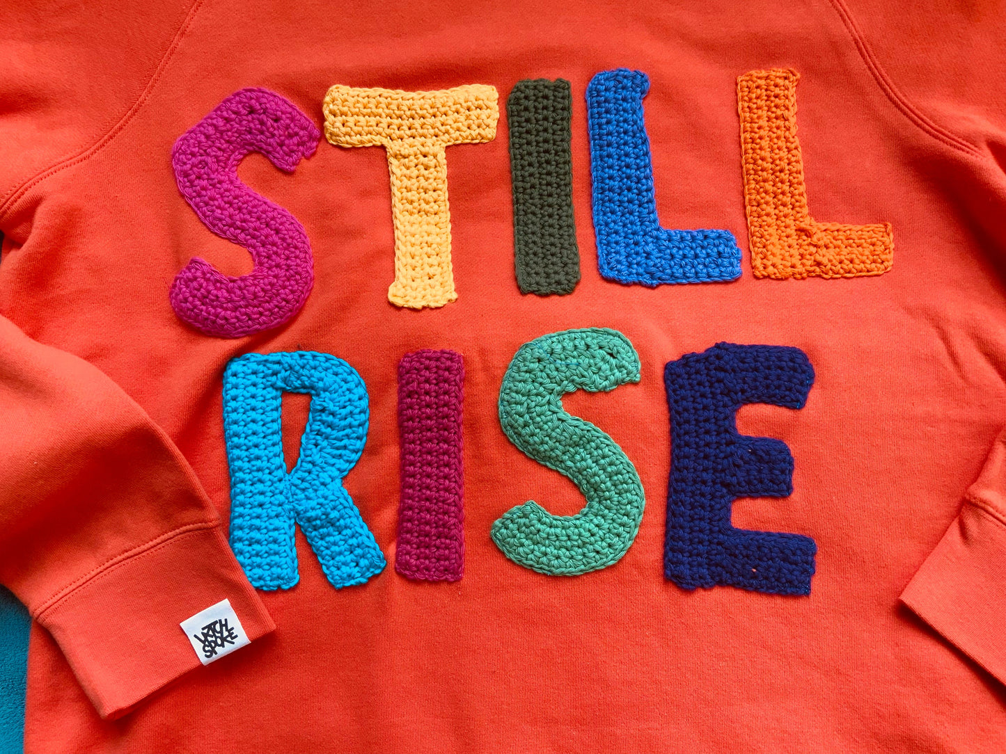 STILL RISE | Maya Angelou Statement Sweatshirt